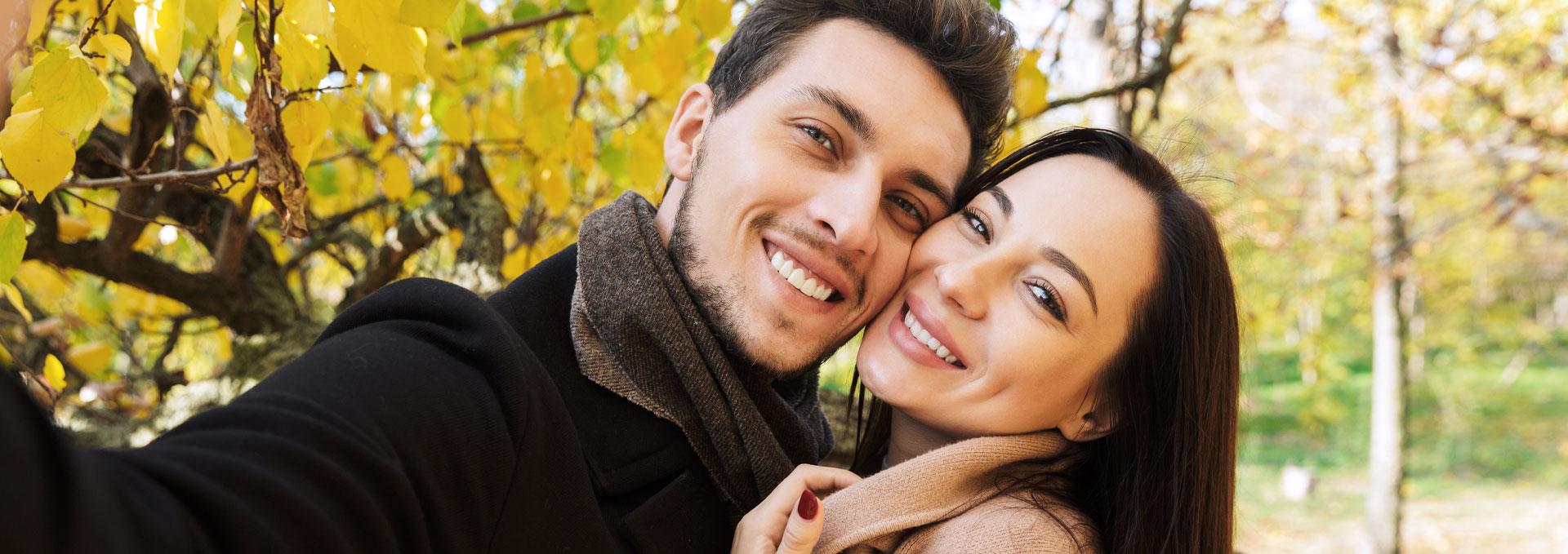 A young couple taking a selfie after going to the dentist in San Francisco